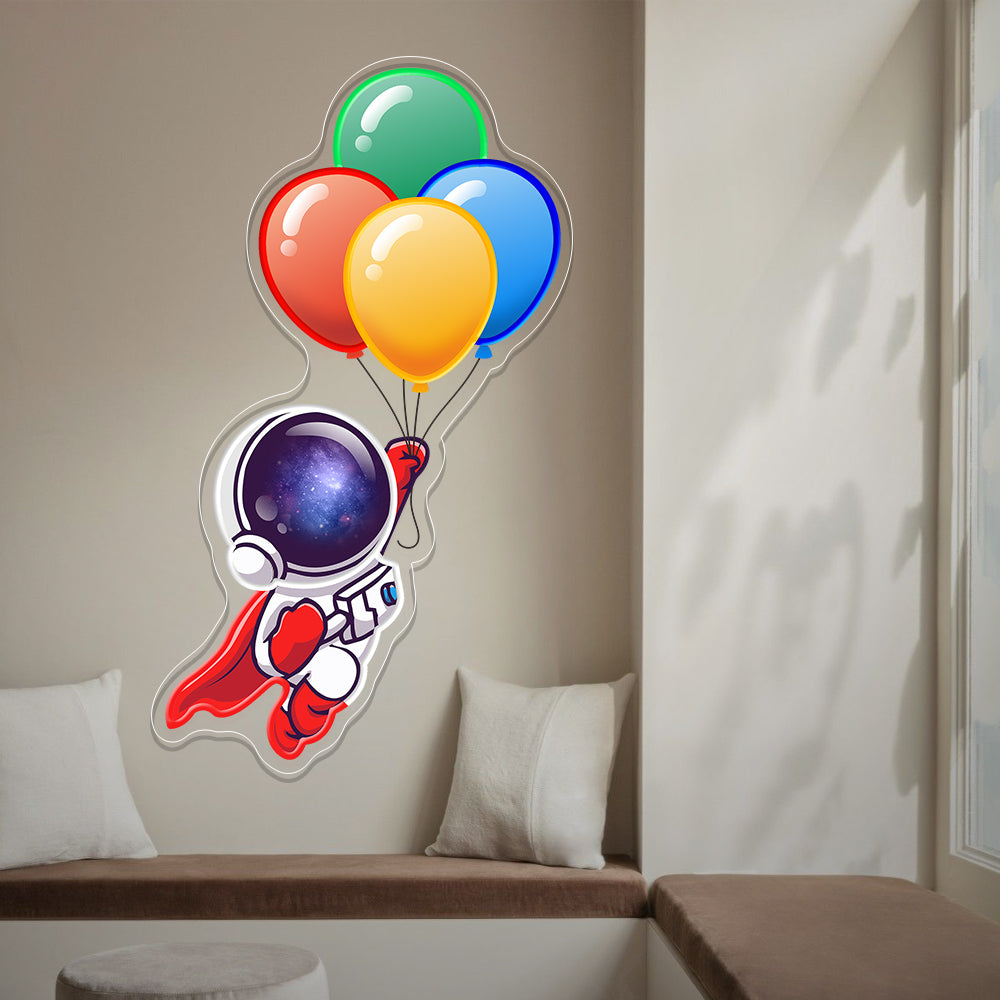 Astronaut Holding Balloons to Space Neon Sign