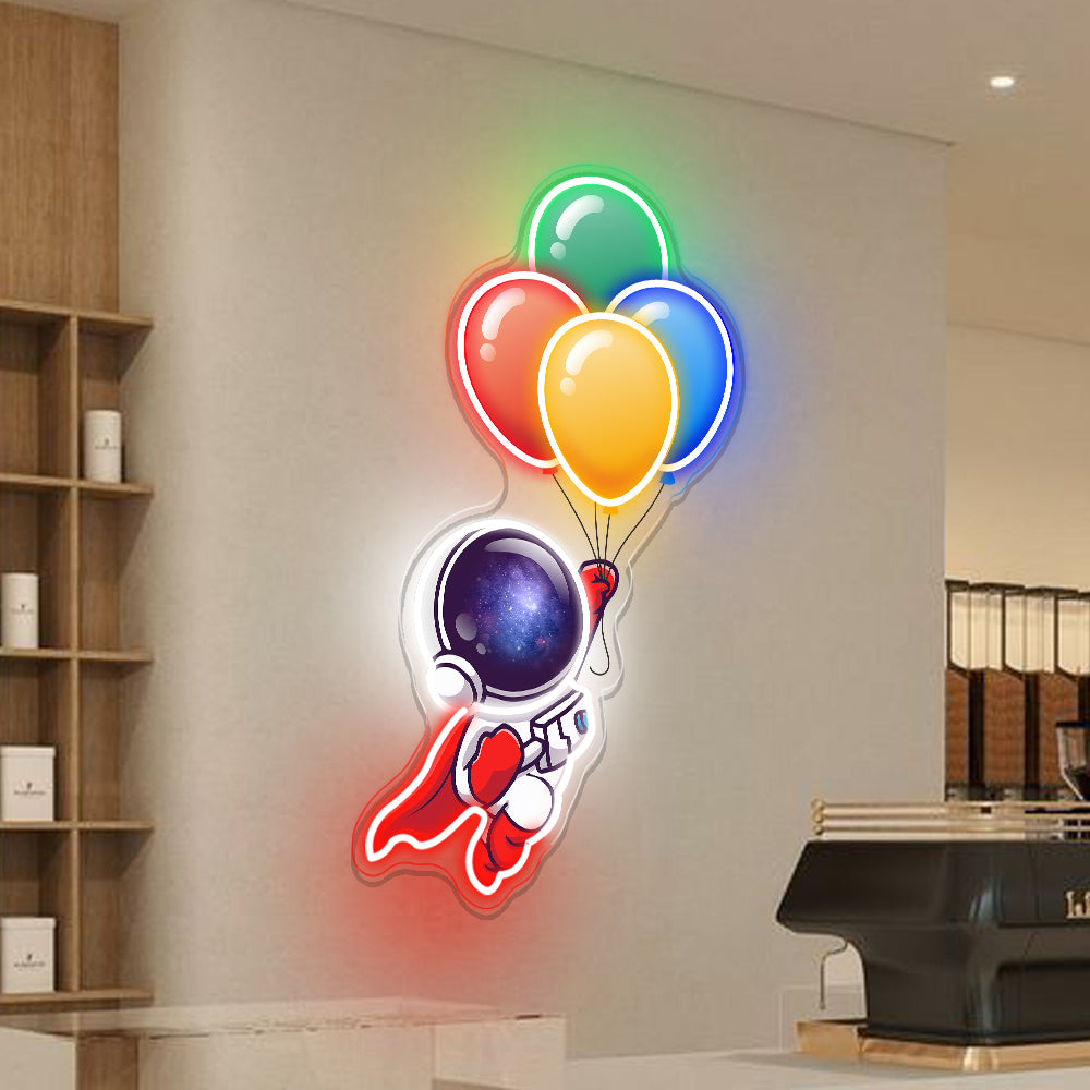 Astronaut Holding Balloons to Space Neon Sign