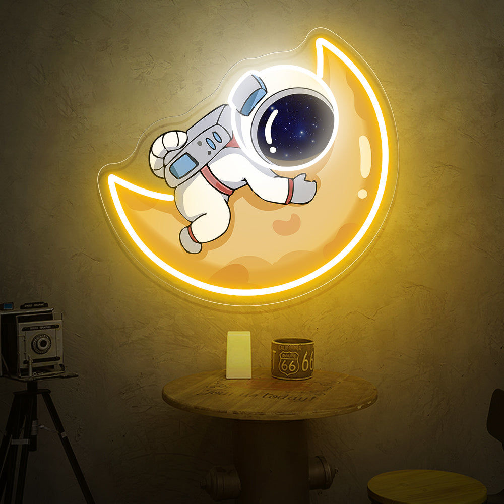 Astronaut Hugging the Moon Neon Sign