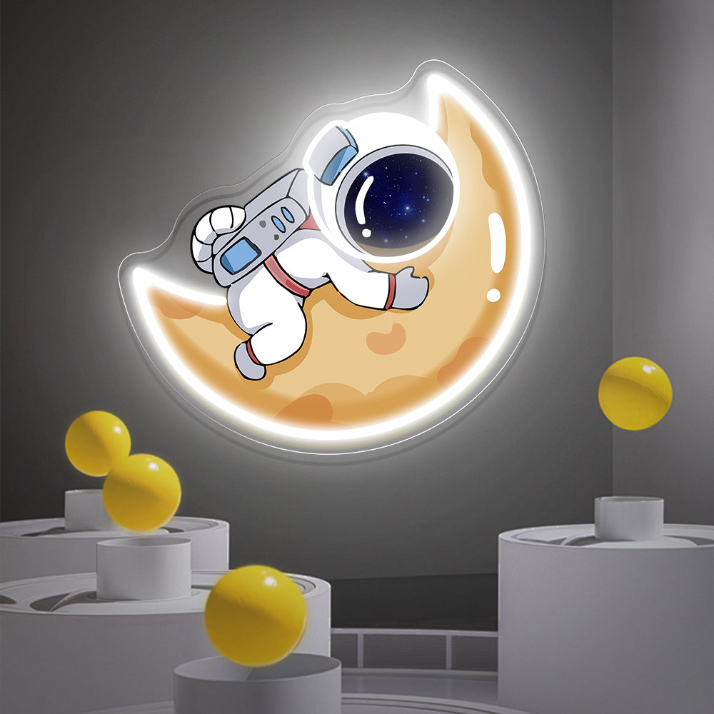 Astronaut Hugging the Moon Neon Sign