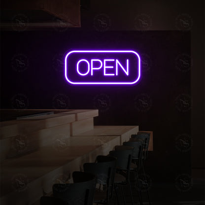 Segno al neon aperto